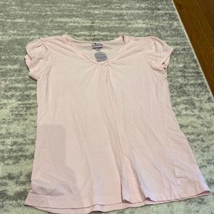 Short sleeve, light pink t-shirt.